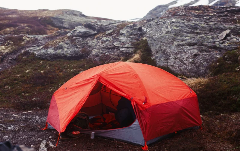 red-tent-stands-ground-somewhere-mountains